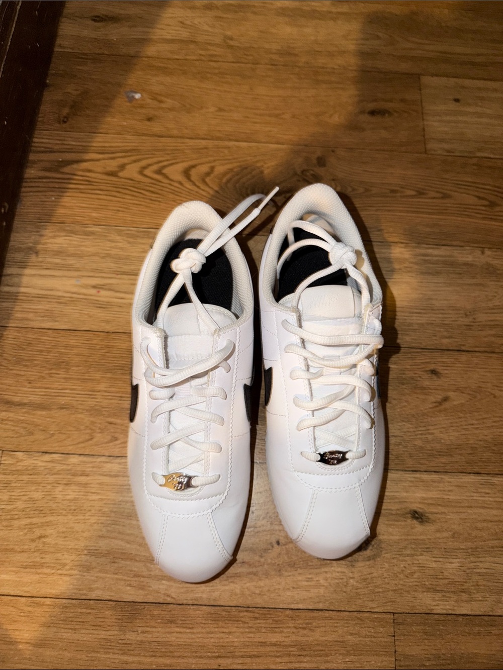 Youth Nike Cortez White Athletic Sneakers with Black Accent